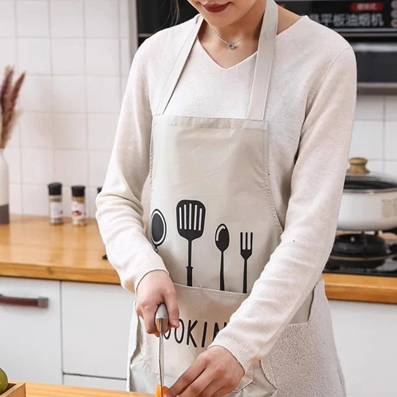 Hold klærne rene med dette oljebestandige unisex forkle. Ideelt for baking og grilling.