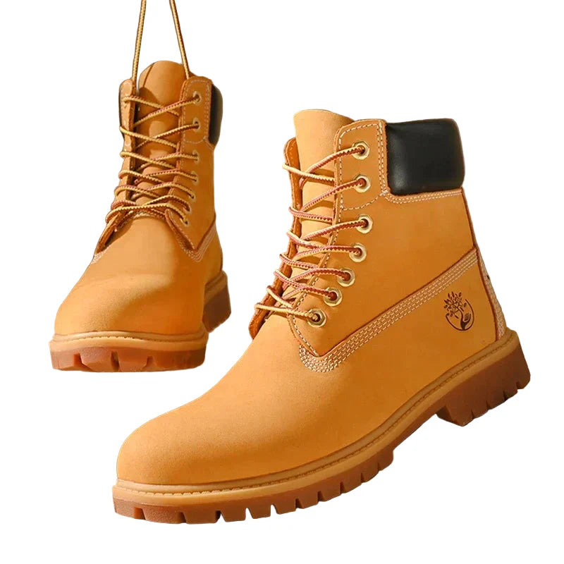 Unisex Outdoor Stiefel aus schwarzem Kunstleder mit SchnĂĽrung, rutschfester Sohle und hohem Schaft.