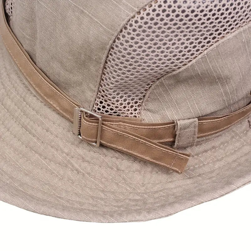 Reiseklar solhatt med bred kant, sammenleggbar design og UV-beskyttelse. Unisex og justerbar.