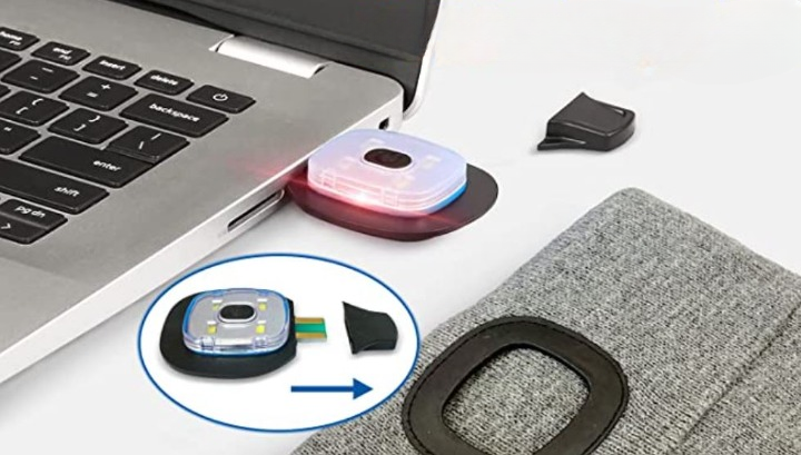 Strikkelue med LED-hodelykt, synlig aktiv i skumringen.