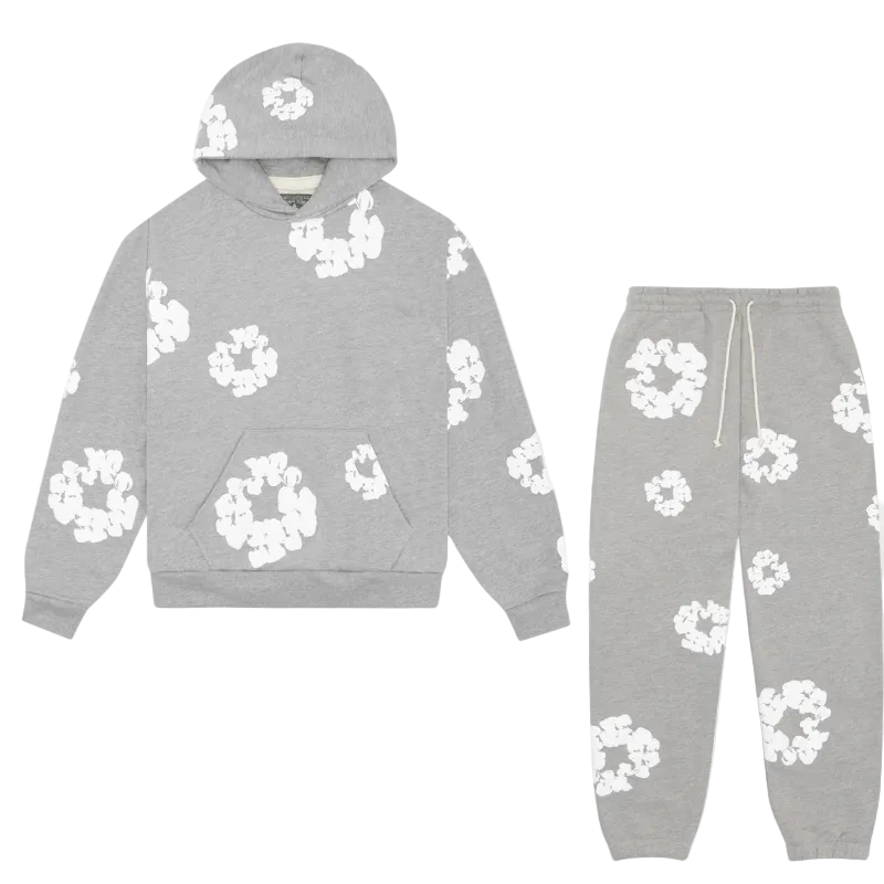 Komfortabel unisex treningsdress med hettegenser og joggebukse. Ideell for avslappet høststil og hverdag.
