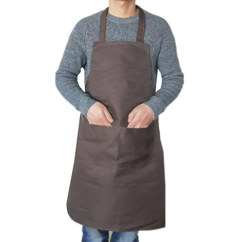 Kjøkkenforkle vanntett, unisex modell, perfekt for alle kjøkkenoppgaver fra baking til grilling.