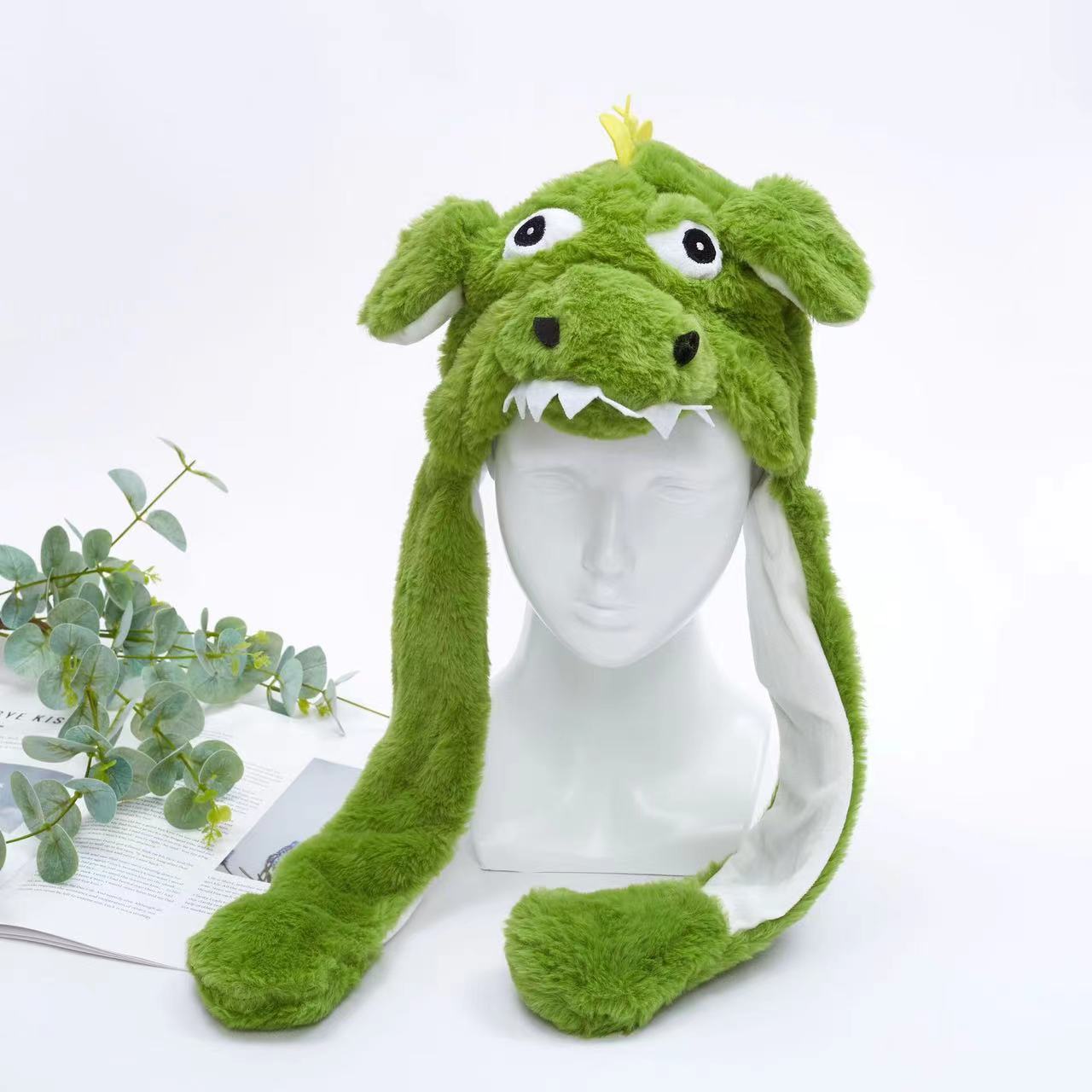 Myk unisex vinterlue, med ører som beveger seg for festlig bruk.