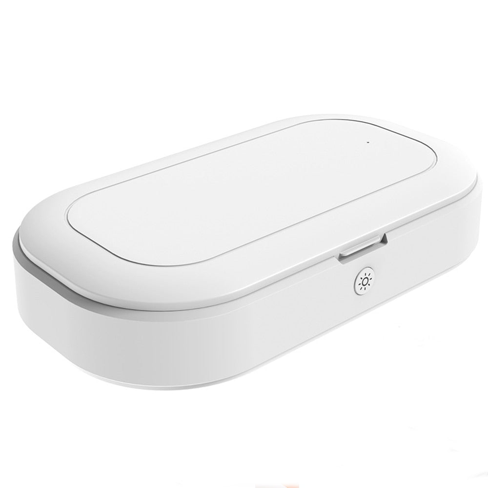 Smarttelefon desinfiseres og lades trådløst i kompakt UV-sterilisator. Eliminerer bakterier og virus.