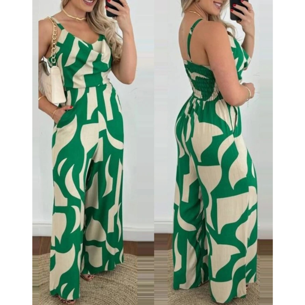 Elegant sommer jumpsuit med V-hals, åpen rygg og vide bukseben. Trendy damemote.