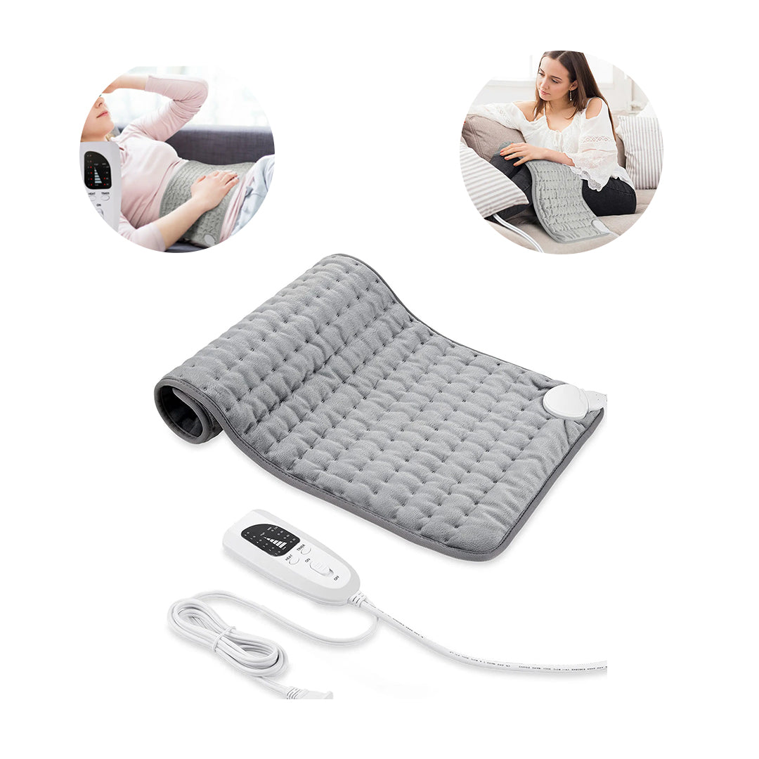 Person nyter dyp varmebehandling fra en myk varmepute på ryggen, perfekt for smertelindring og avslapning.