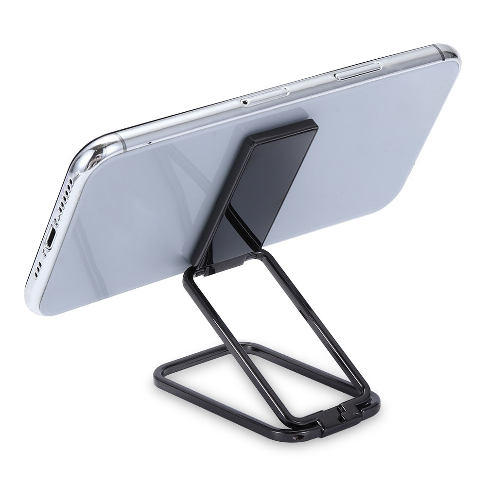 Solid mobilholder og stativ i ett, en 360° roterende telefonring i metall for sikkert og komfortabelt grep.