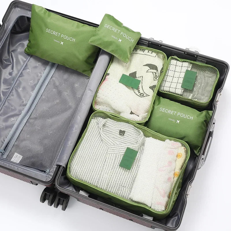 "6-teiliges wasserfestes Kofferorganizer Set, variabel in Größe, aus robustem Oxford-Stoff, ideal für Reisen."