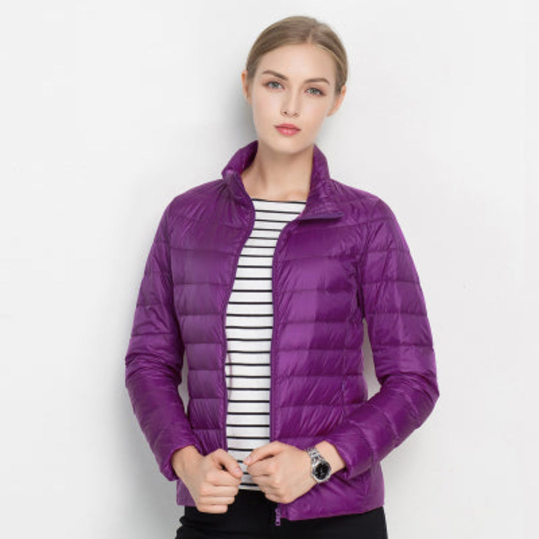 "Damen Langarm Steppjacke in Beige, stylisch gesteppter Stoff, ideal für kalte Tage, elegant und vielseitig tragbar."