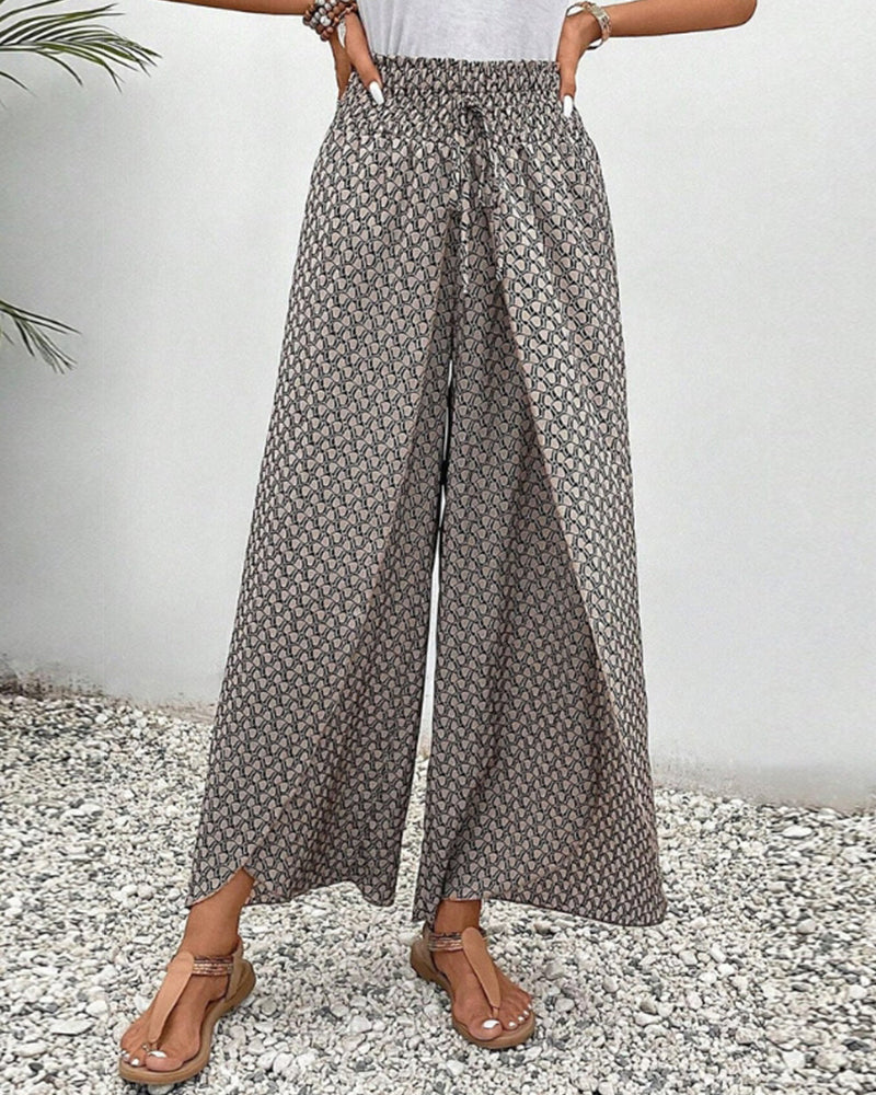 "Damen Sommerhose mit hoher Taille, geometrischer Druck, schmeichelhafte Silhouette, stilvoll und komfortabel, Seitenansicht"