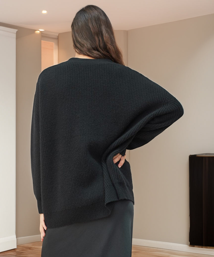 "Damen Strickjacke aus weichem Stoff in Schwarz, elegant mit Knopfleiste, ideal für Alltag und besondere Anlässe."