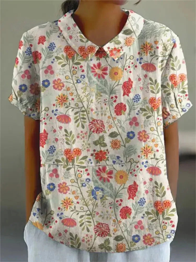 "Damen Vintage Blumenbluse mit zartem Blumenmuster, lässiger Schnitt, feminines Design, ideal für Alltag und besondere Anläss