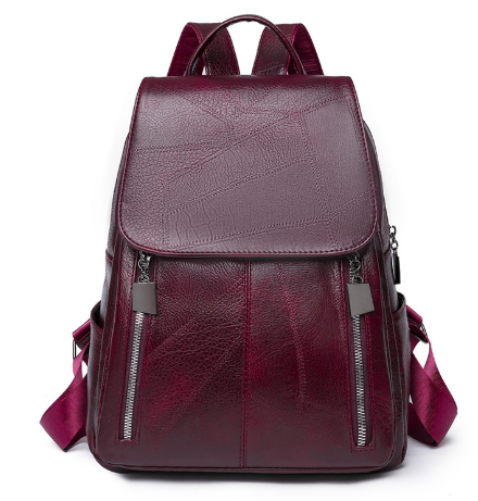 Diebstahlsicherer Lederrucksack für Damen, elegant in Braun, mit verstellbaren Trägern und robusten Reißverschlüssen.