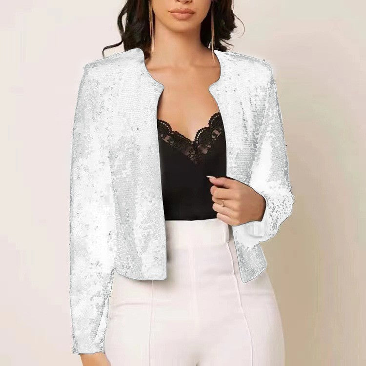 "Elegante glitzernde Damenjacke mit taillierter Passform, ideal für festliche Anlässe, in Silber und Magenta erhältlich."