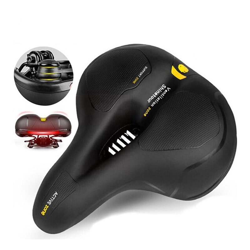 Ergonomischer ComfortRide Fahrradsattel mit dicker Polsterung, reflektierenden Streifen und Belüftungsschlitzen für Komfort.
