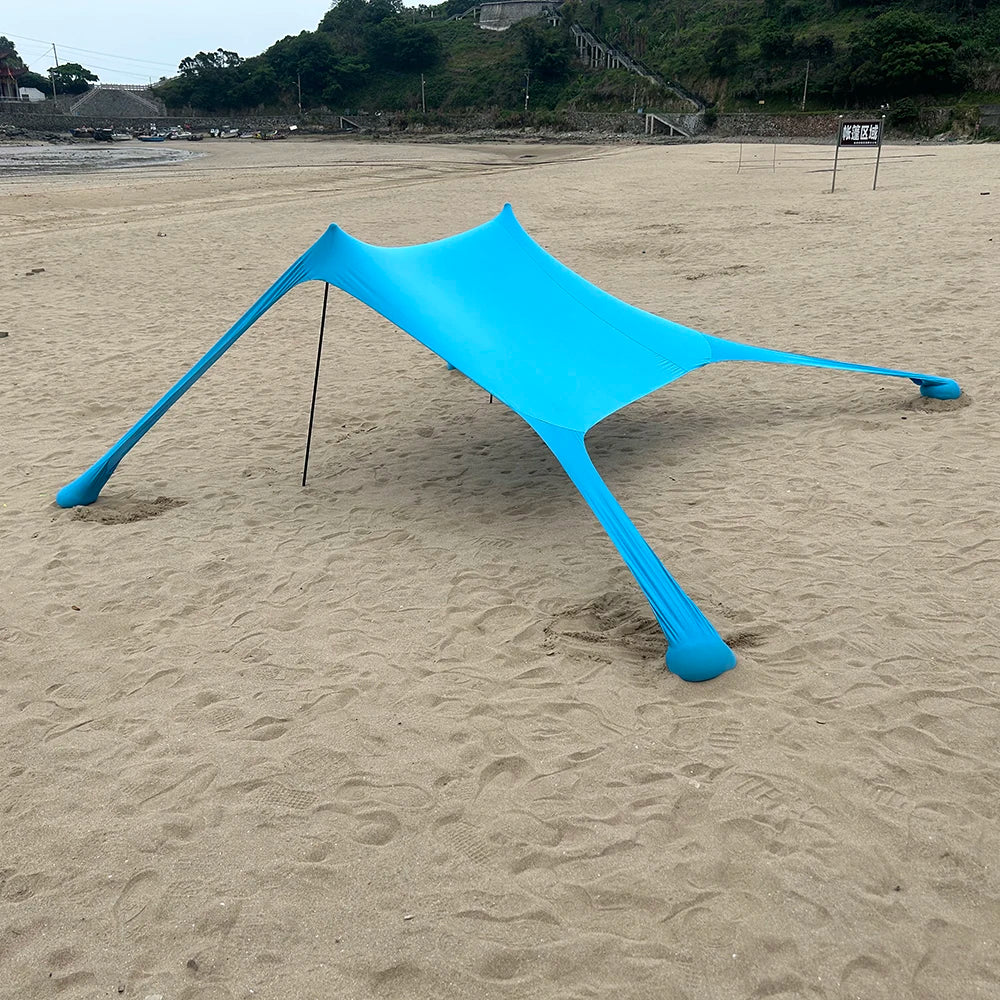 "Geräumige Strandmuschel mit UPF50+ UV-Schutz, geeignet für 3–4 Personen, ideal für sonnige Ausflüge am Strand."
