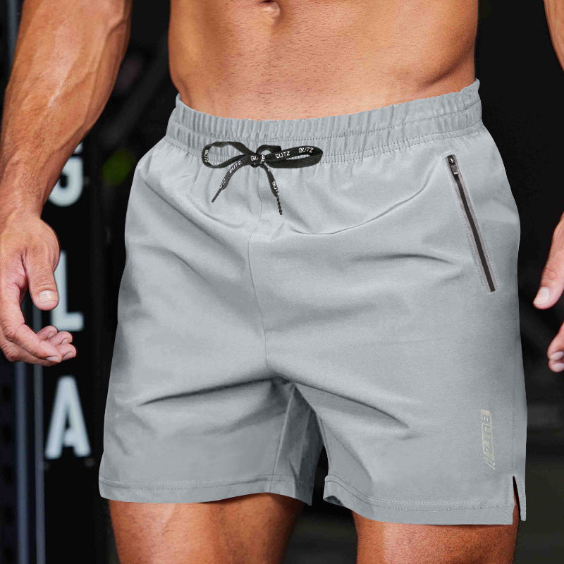 "Herren Sport-Shorts, frontansicht, schnell trocknend, elastischer Bund, reißverschlusstaschen, ideal für Fitness und Freizei