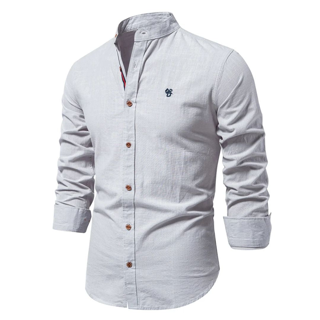 "Klassisches navyblaues Herren-Langarmtrachtenhemd, atmungsaktiv und aus 100% Baumwolle, ideal für Alltag und Anlässe."