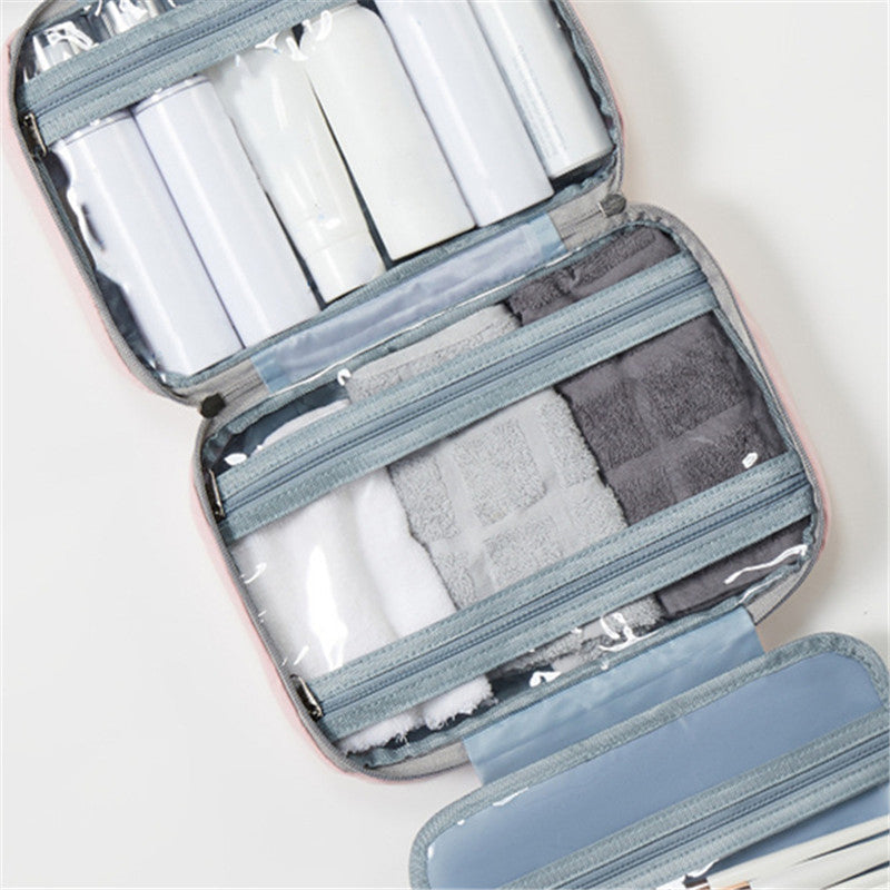 "Kompakter, wasserabweisender Reise-Kosmetik-Organizer mit Hanf-Optik, 4 Fächern, transparenten Seiten und Haken."