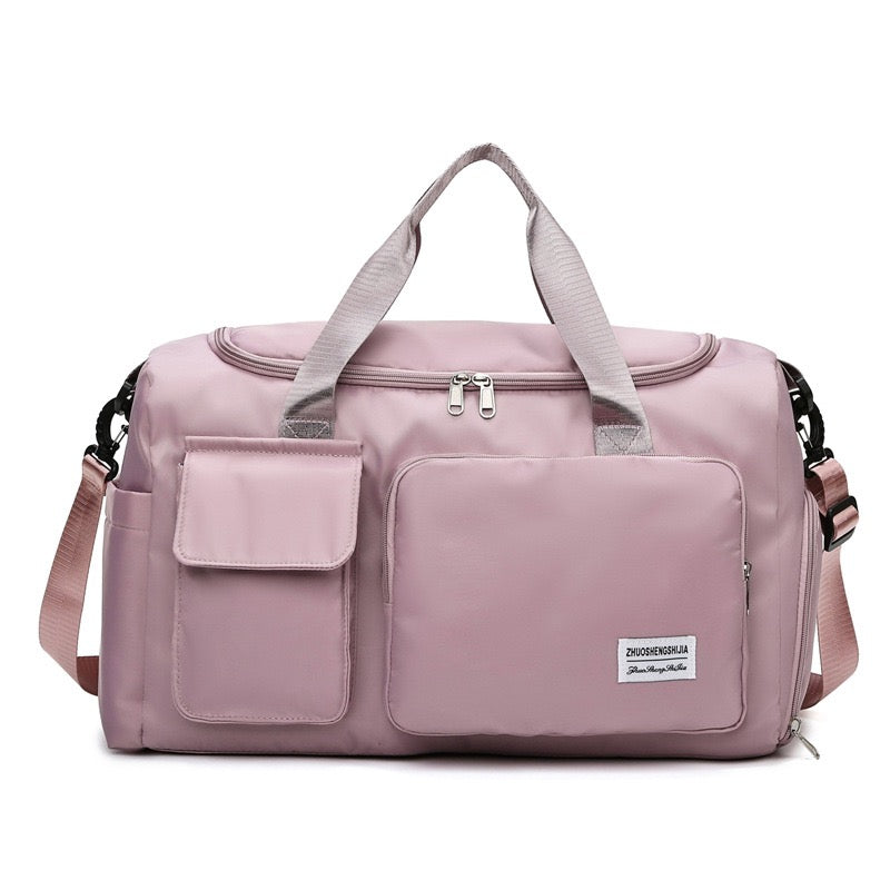 "Lila wasserdichte Reisetasche aus Oxford-Stoff, multifunktional, mit mehreren Fächern für Sport und Reisen."