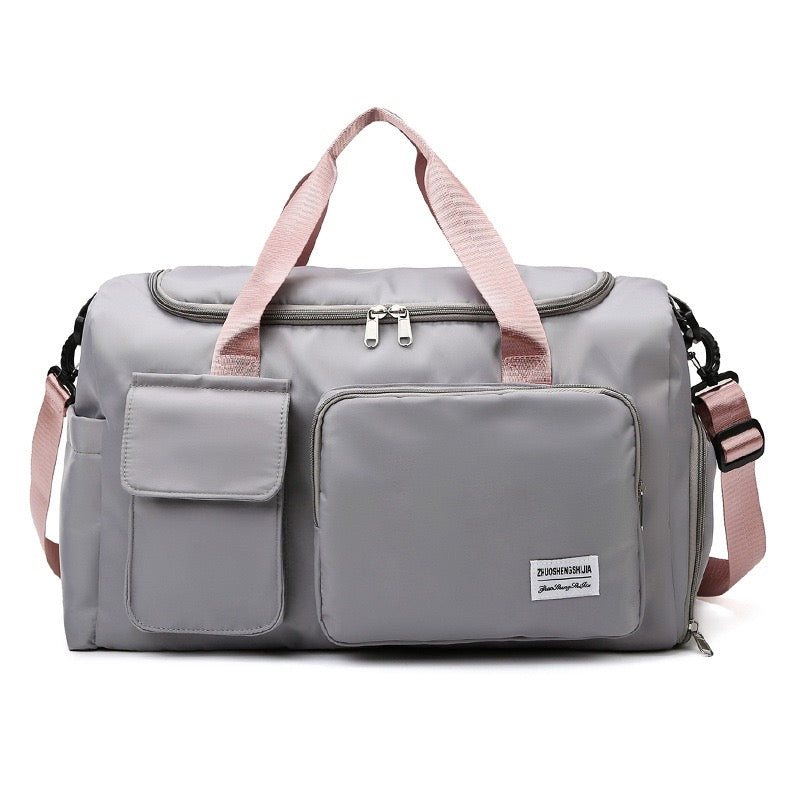 "Lila wasserdichte Reisetasche aus Oxford-Stoff, multifunktional, mit mehreren Fächern für Sport und Reisen."