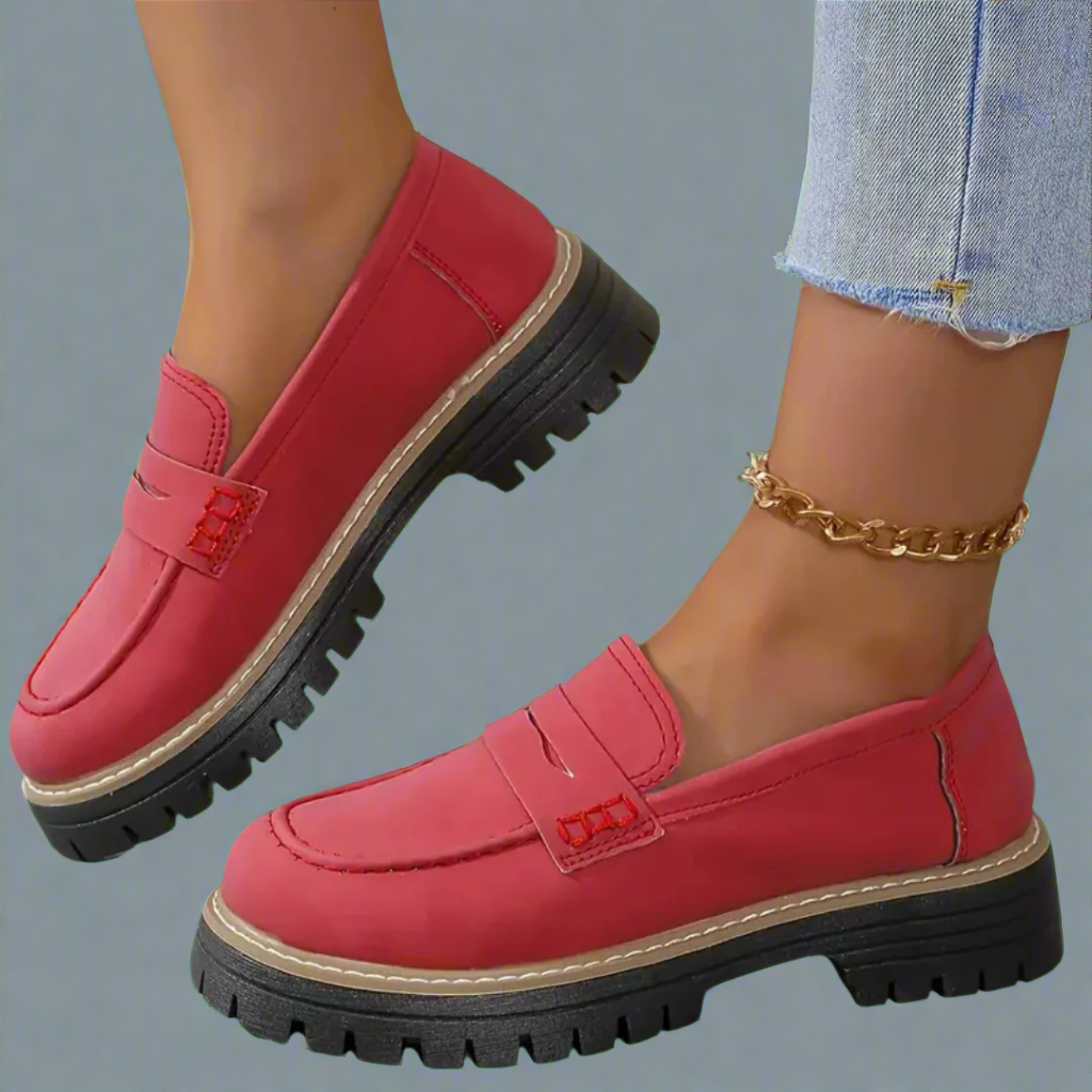 "Luxuriöse Damen Loafer in Dunkelblau, zeitloses Design, hochwertige Materialien, ideal für Büro oder Alltag."