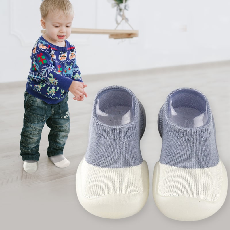 Rutschfeste, atmungsaktive Babyschuhe aus flexiblem, leichtem Material für natürliche Fußentwicklung und sicheren Halt.