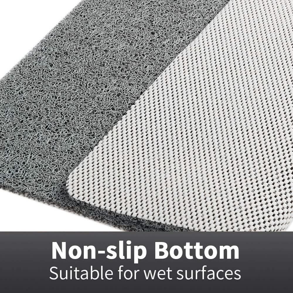 "Rutschfeste, graue Duschmatte mit offenem Drainage-Design, loofah-ähnlicher Oberfläche und Anti-Slip-Unterseite."