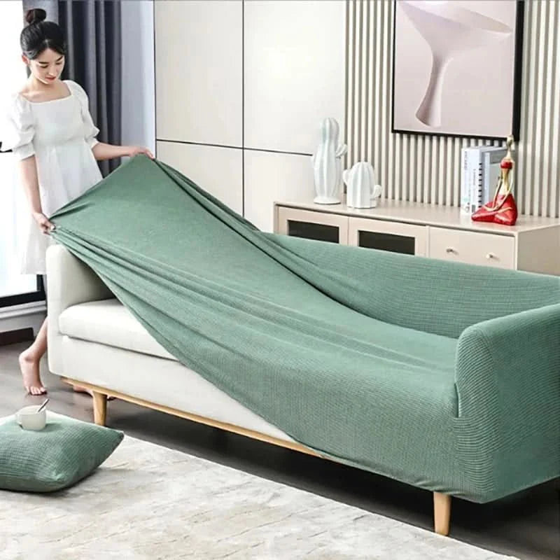"Wasserdichter Sofabezug aus Jacquard-Stoff in Beige, schützt vor Flecken, stilvolles Design, für Haustiere geeignet."