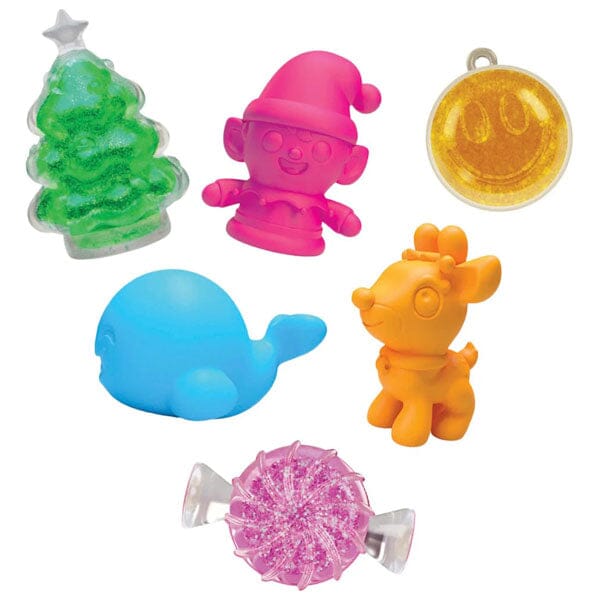 Barn som utforsker en julekalender fylt med morsomme og stimulerende fidget-leker.