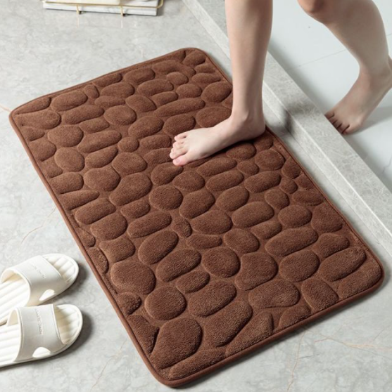 Trygg antiskli badematte i minneskum, sklisikker dusjmatte for komfort og stabilitet på badet.