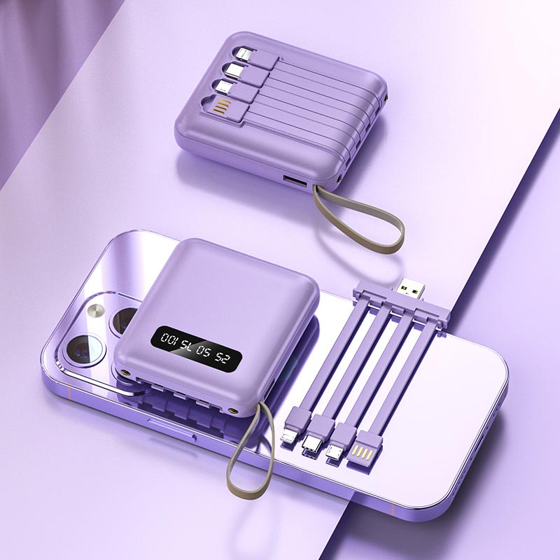 Kraftig 20000mAh bærbar lader med integrerte kabler, perfekt for en strømkilde på farten.