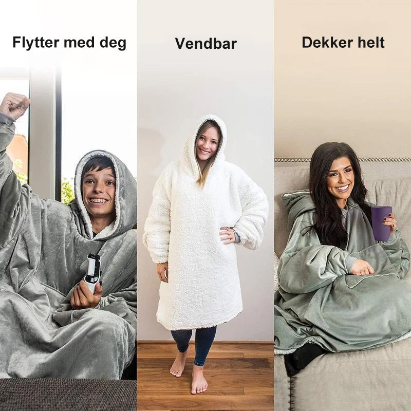 Kvinne iført et varmt, oversized bærbart teppe med hette, ideelt for kalde dager og hjemmekos.