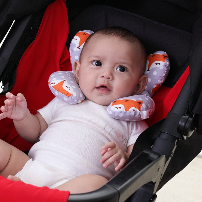 Trygg og støttende nakkepute baby for lange bilturer