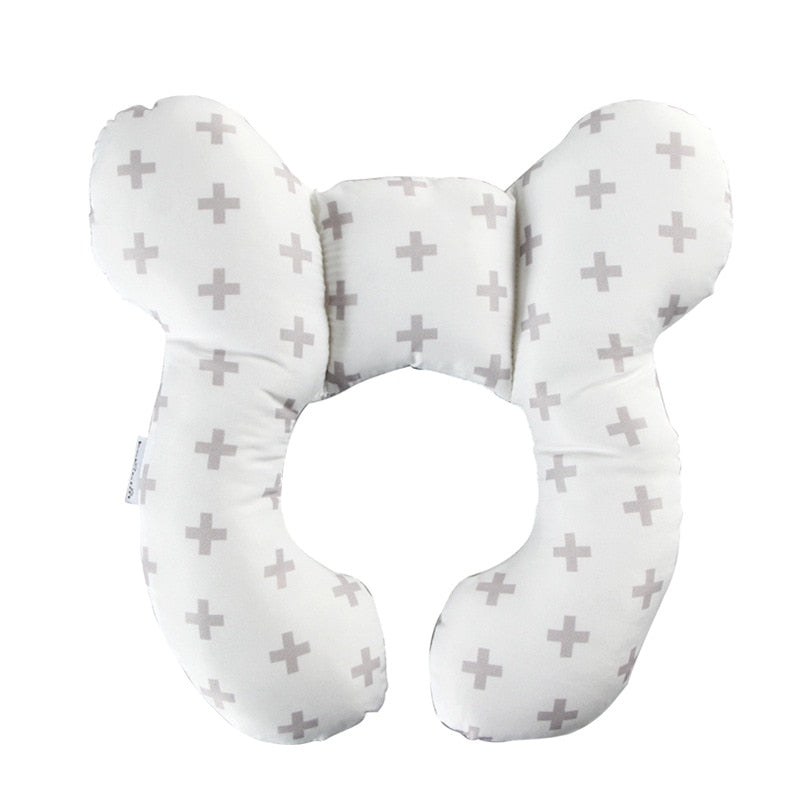 Komfortabel nakkepute baby designet for spedbarnets hode