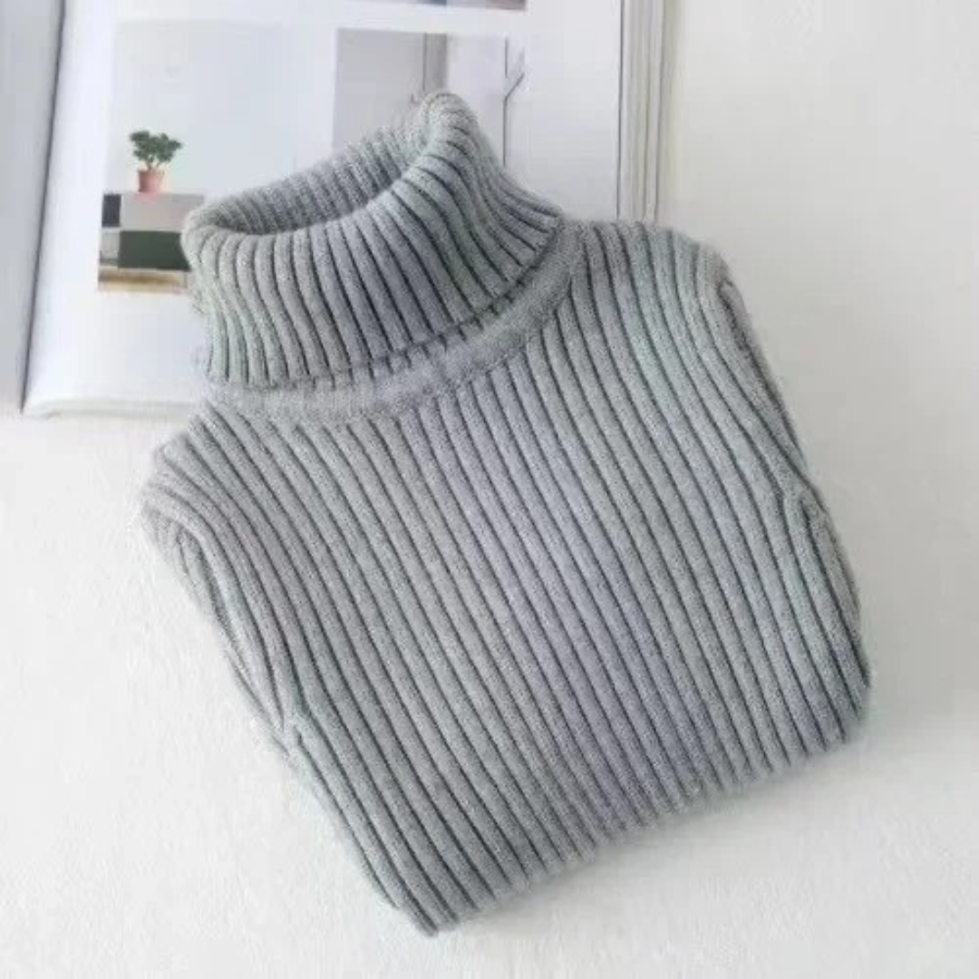 Varm og komfortabel barne strikkegenser med turtleneck design.