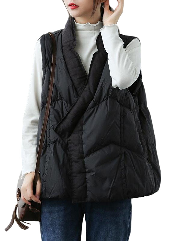 Beige dame puffer vest for varm vinterstil. Komfortabel og romslig vest for kvinner, perfekt for lagpålag.