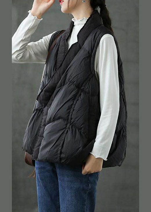 Damevest i lys brun puffer-design. Perfekt varm vintervest for motebevisste kvinner, allsidig og casual.