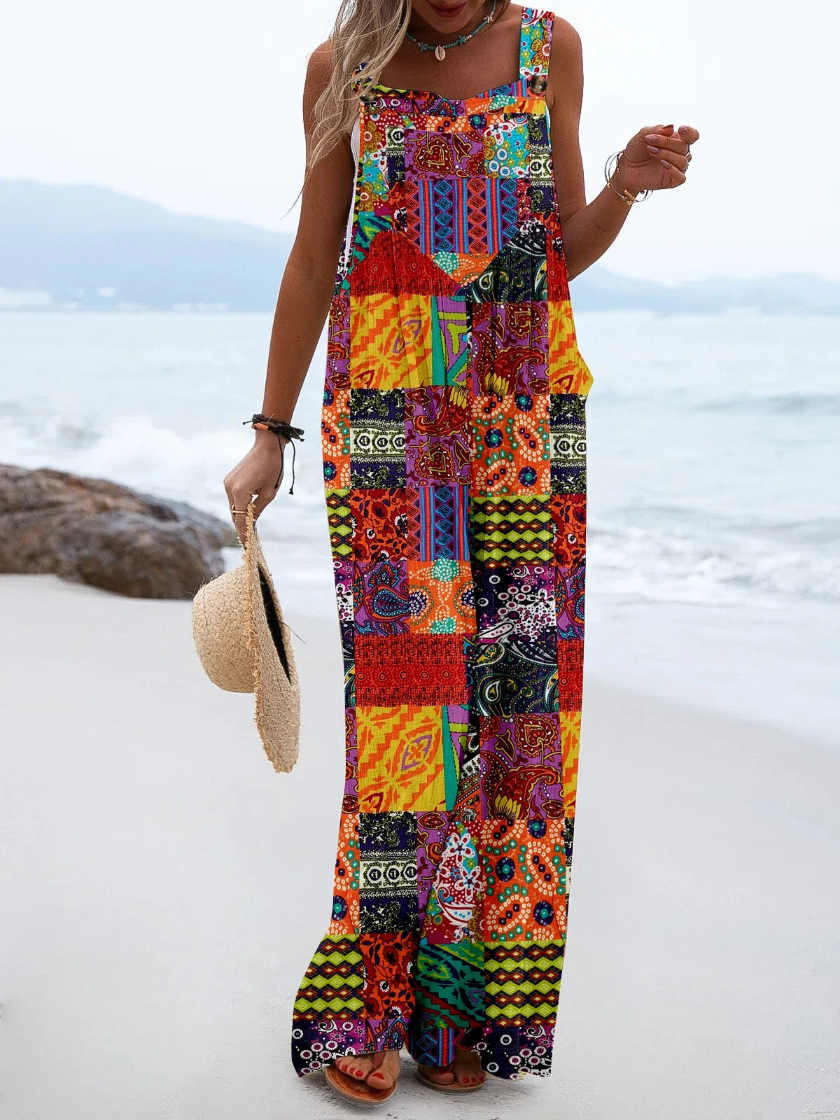 Kvinner jumpsuit med praktiske lommer, vide ben og bohemsk design, ideell for sommer casual bruk.