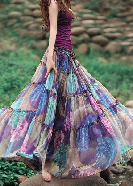 Lett chiffon sommerskjørt med bohemsk patchwork-design, rynket stil og praktisk justerbar snøring.