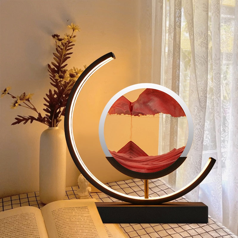 Stilren bordlampe med 3D sandkunst for en beroligende atmosfære i hjemmet.