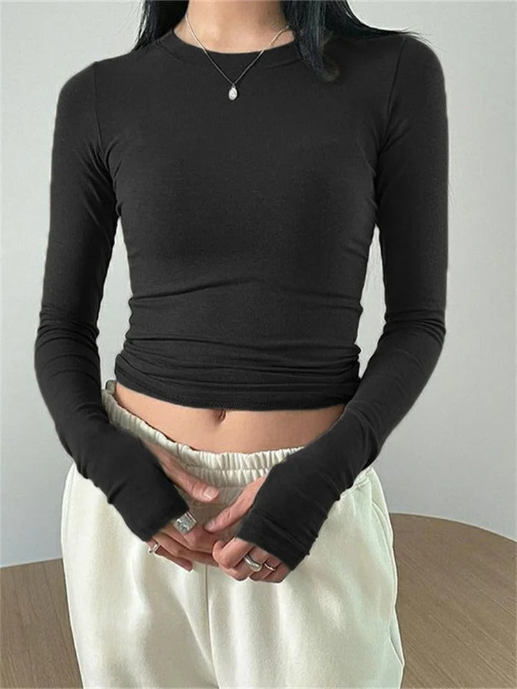 Smaltsittende topp med rund hals for kvinner. Langermet design i komfortabel, trendy stil.