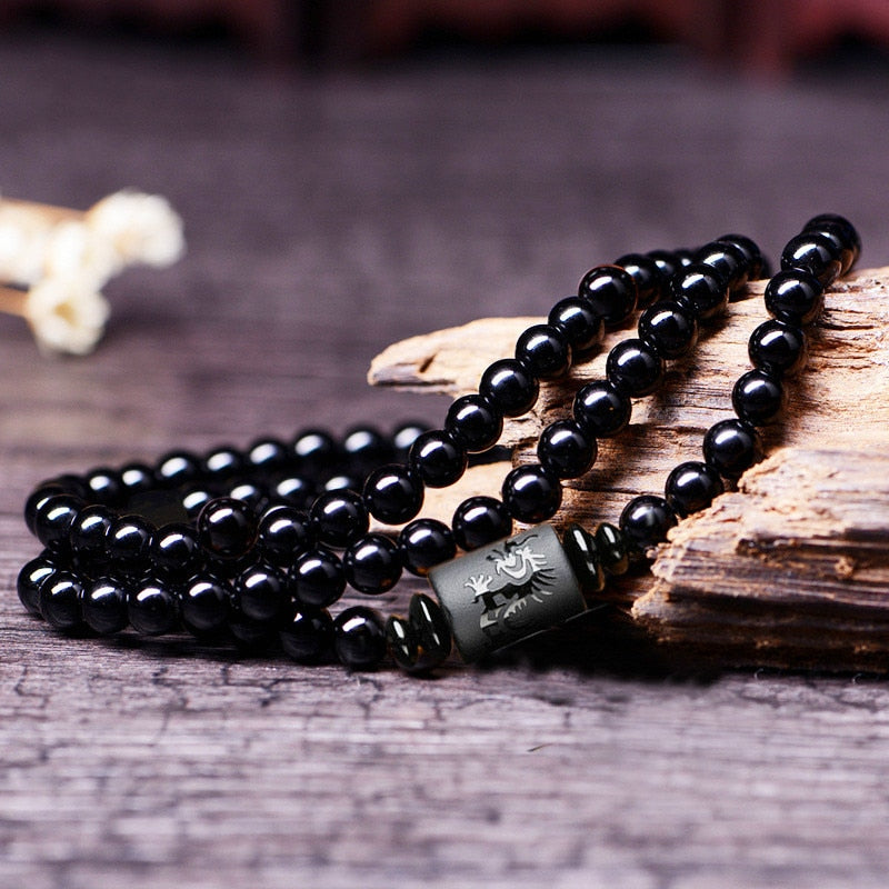 Håndledd viser unisex drage og føniks armbånd, perfekt for balanse og beskyttelse, vulkansk glass.