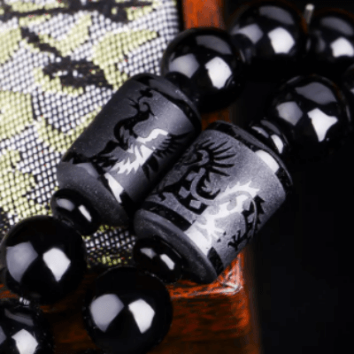 Drage og føniks smykke i vulkansk glass og steinperler, kraftfull energi for herre og dame.