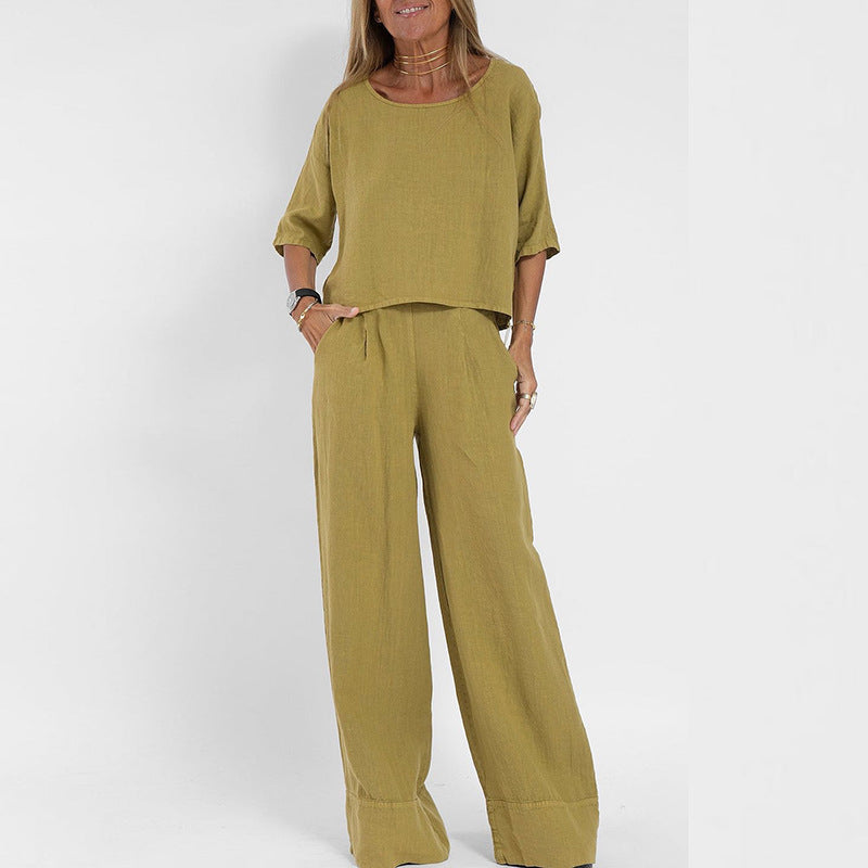 Dame todelt sommerantrekk: kortermet topp og vide bukser for en avslappet, komfortabel og trendy look. Ideelt for fritid.