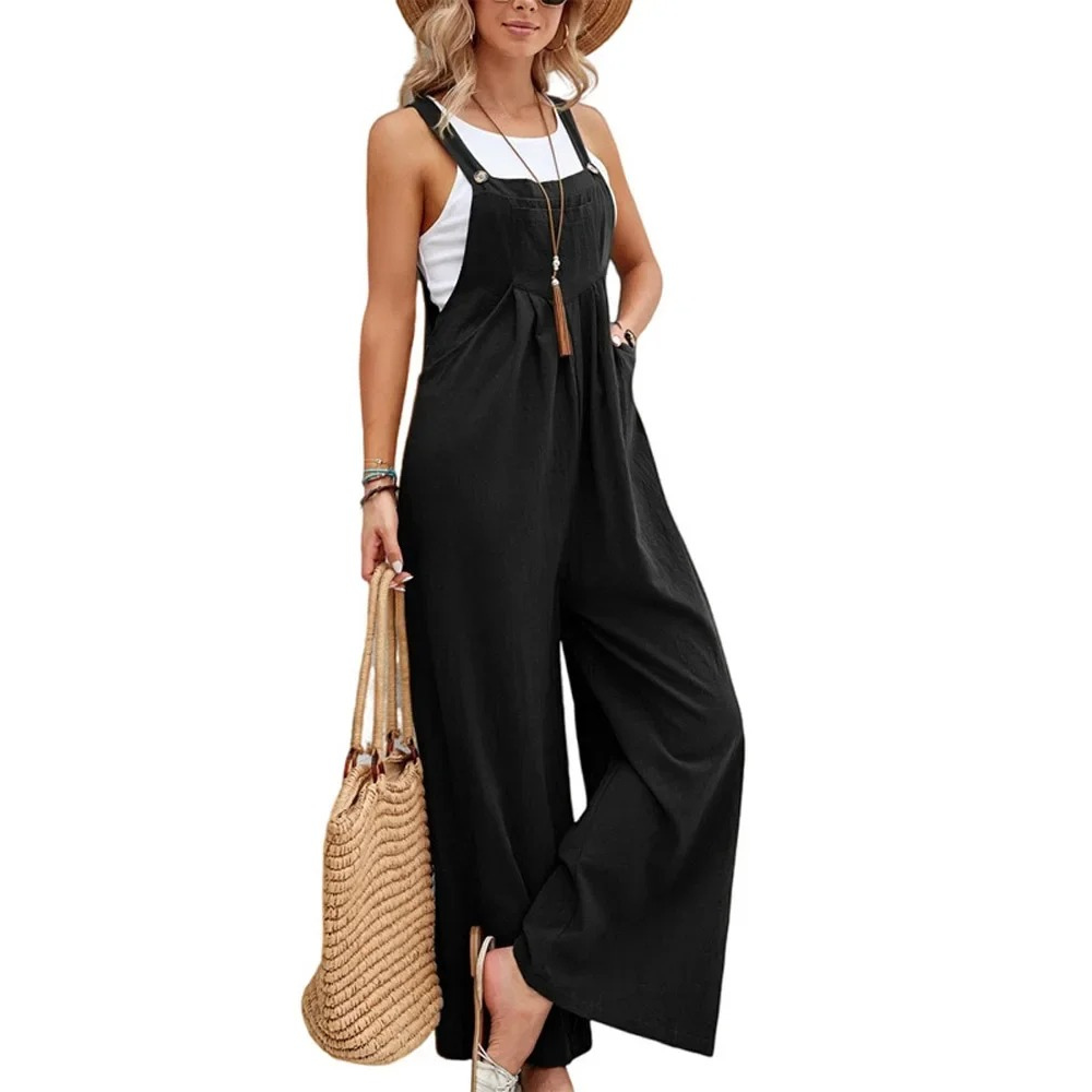 Komfortabel baggy bib jumpsuit med brede ben i solid stoff. Perfekt damekjeledress for avslappet stil.