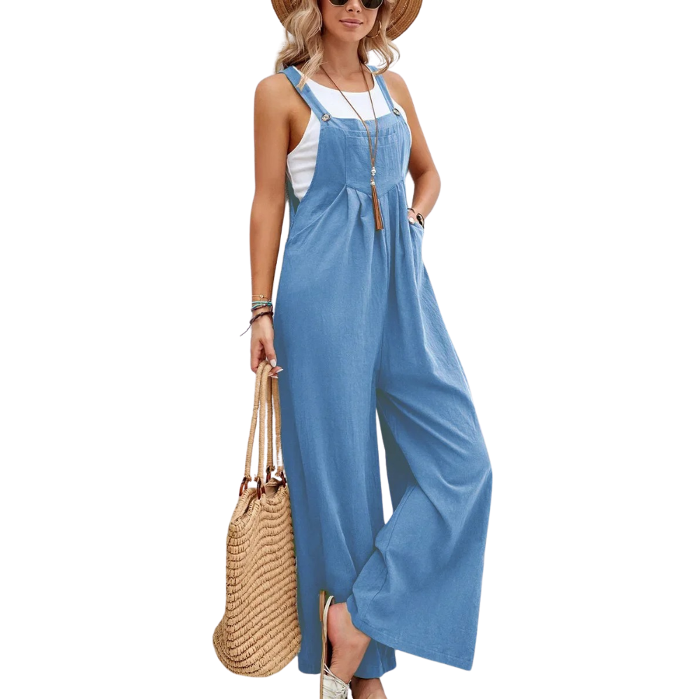 Dame bib jumpsuit i mykt materiale med baggy passform og brede ben. Moderne og komfortabel kjeledress.