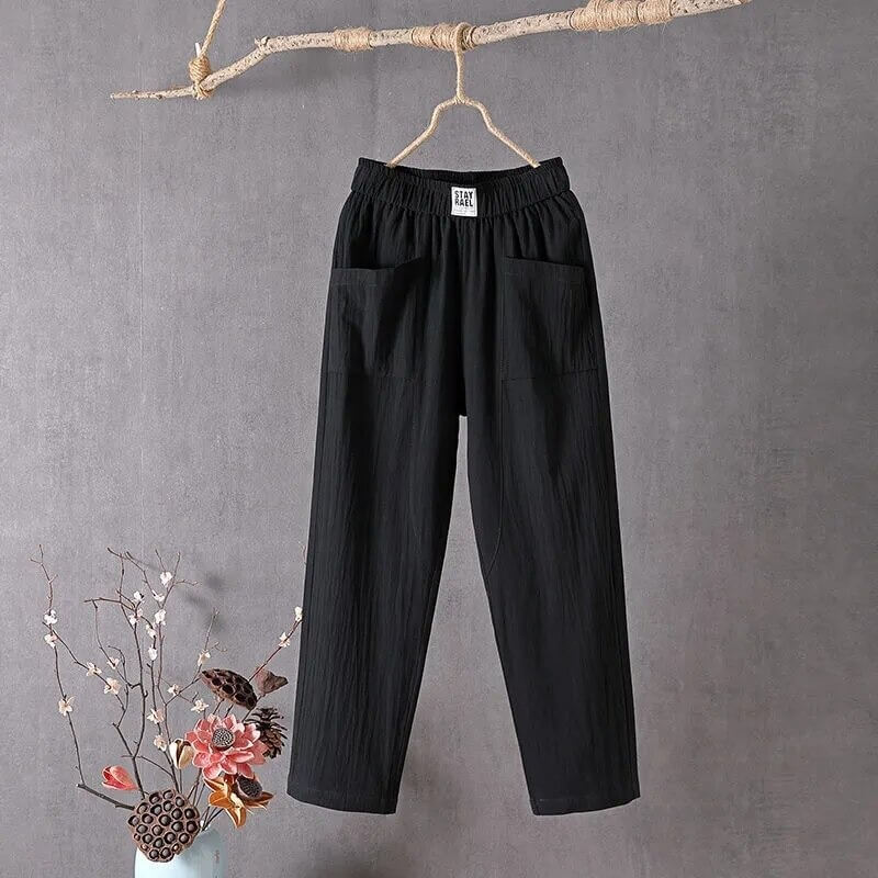 Trendy baggy-bukser til dame, med høy midje og ankellengde. Stilrene bomullsbukser for moderne, avslappet mote.