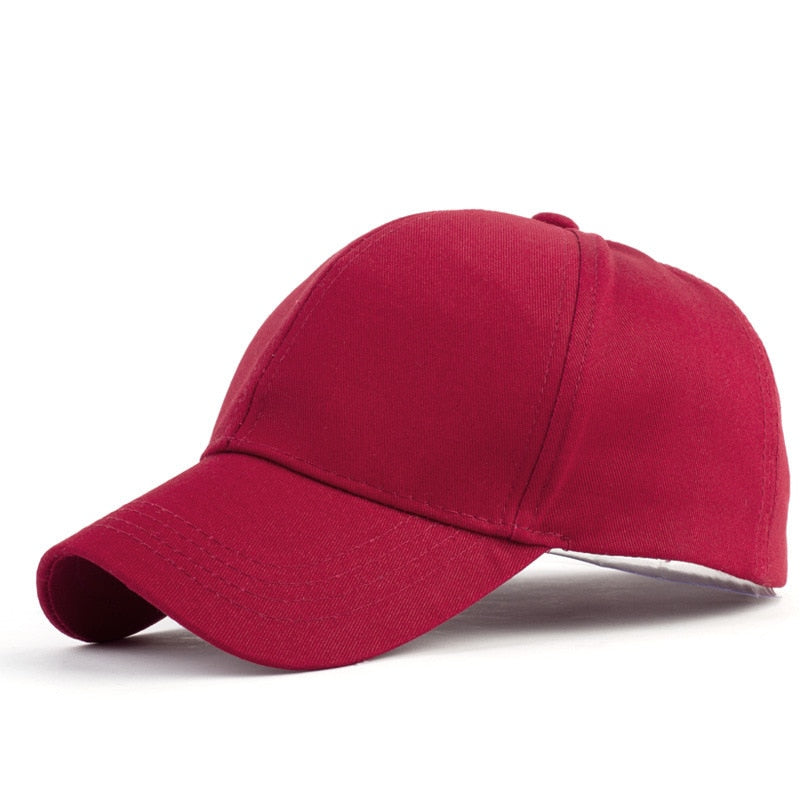 Komfortabel dame baseballcaps, spesialdesignet for rotete bolle og hestehale frisyrer.