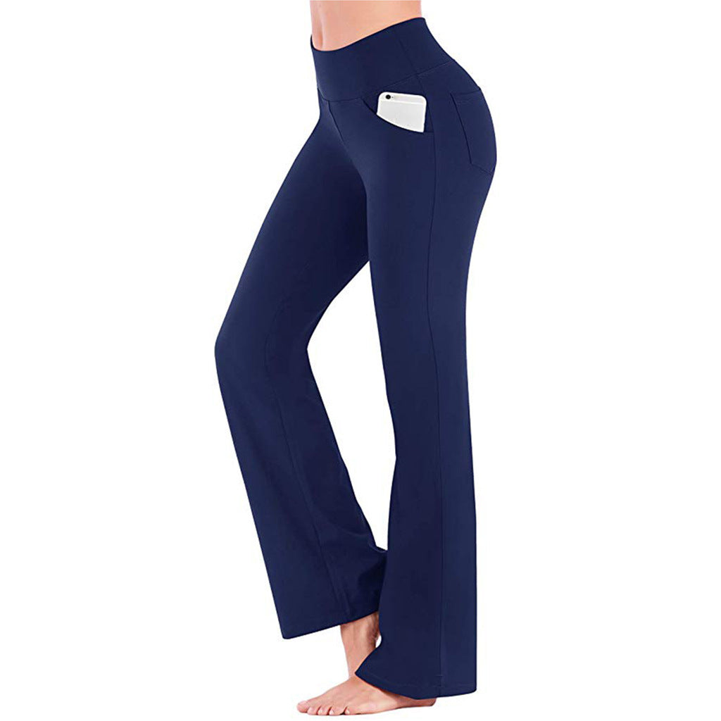 Stilige dame bootcut yogabukser med høy midje, viser slankende silhuett og elastisk stoff. Ideell for activewear.